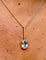 Pendentif et chaîne en deux ors 18 carats et aigue-marine 58 Facettes 91014