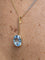 Collier Pendentif et chaîne en deux ors 18 carats et aigue-marine 58 Facettes 91014