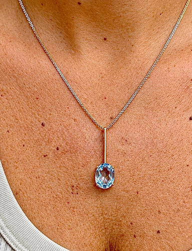 Pendentif et chaîne en deux ors 18 carats et aigue-marine 58 Facettes 91014