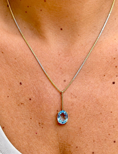 Pendentif et chaîne en deux ors 18 carats et aigue-marine 58 Facettes 91014