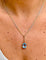 Pendentif et chaîne en deux ors 18 carats et aigue-marine 58 Facettes 91014