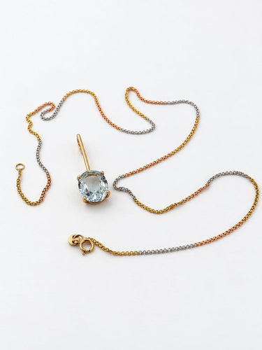 Pendentif et chaîne en deux ors 18 carats et aigue-marine 58 Facettes 91014