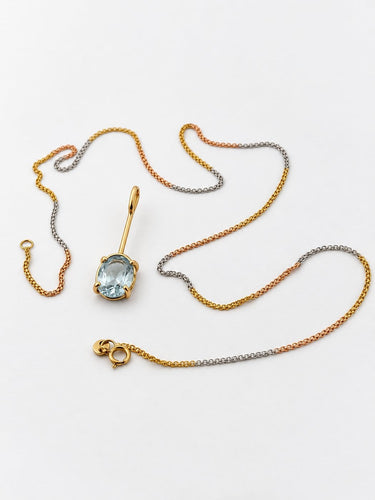Pendentif et chaîne en deux ors 18 carats et aigue-marine 58 Facettes 91014