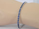 Bracelet tennis en or blanc et saphirs naturels 58 Facettes 2906