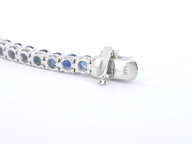 Bracelet tennis en or blanc et saphirs naturels 58 Facettes 2906