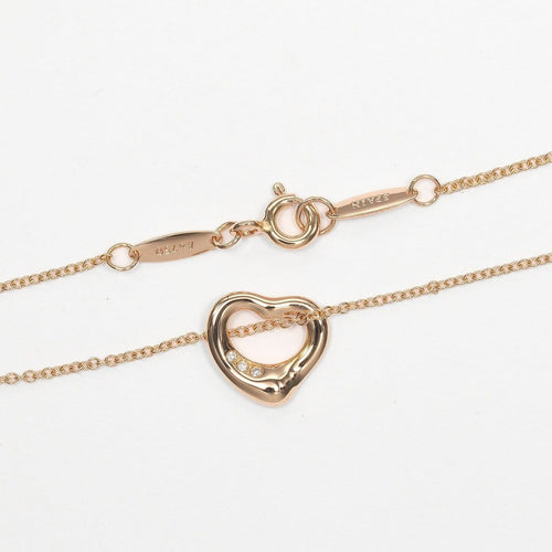 Tiffany & Co. Elsa Peretti - Pendentif Open Heart en or rose et diamants 58 Facettes al4v8l38yq