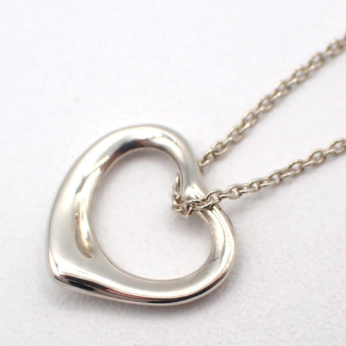Tiffany & Co. Elsa Peretti - Pendentif Open Heart en argent 58 Facettes woody1zpju