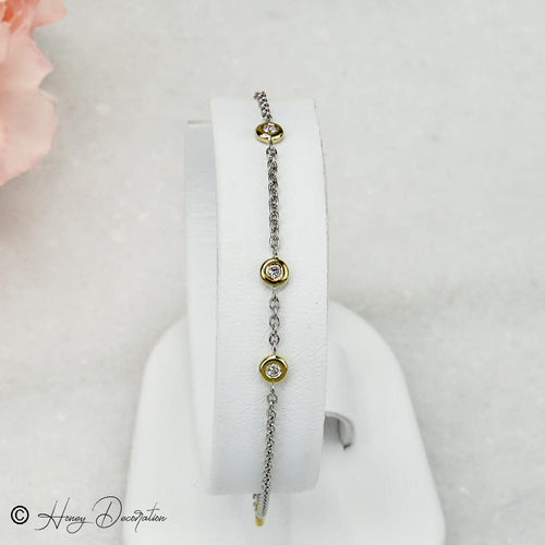 Bracelet Bracelet en platine et or jaune 750 avec cinq diamants 58 Facettes 2485