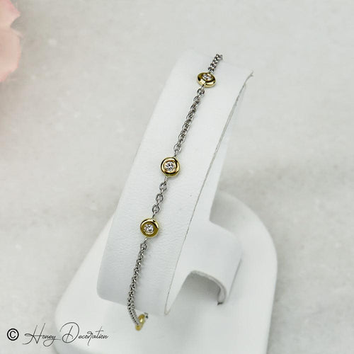 Bracelet Bracelet en platine et or jaune 750 avec cinq diamants 58 Facettes 2485