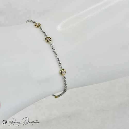 Bracelet Bracelet en platine et or jaune 750 avec cinq diamants 58 Facettes 2485