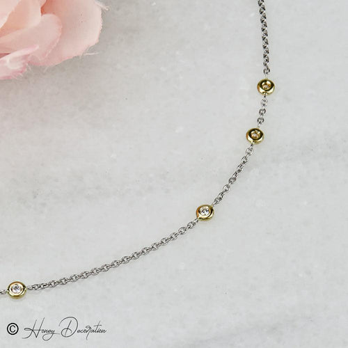 Bracelet Bracelet en platine et or jaune 750 avec cinq diamants 58 Facettes 2485