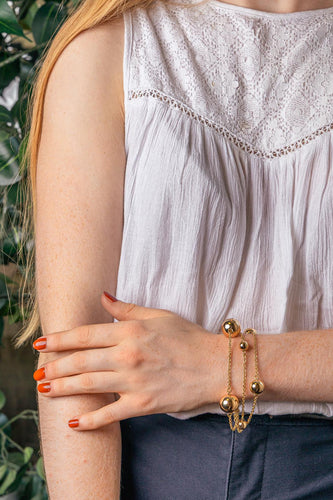 Bracelet boules en or jaune 58 Facettes 5742132CN