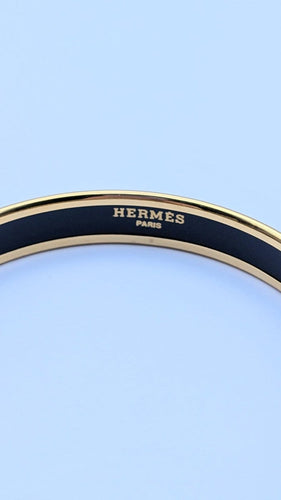 Hermès - Bracelet jonc en plaqué or et émail 58 Facettes 1321