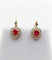 Boucles d'oreilles Dormeuses marguerite en or 18k, rubis synthétiques et diamants 58 Facettes A07748