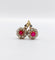 Boucles d'oreilles Dormeuses marguerite en or 18k, rubis synthétiques et diamants 58 Facettes A07748
