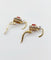 Boucles d'oreilles Dormeuses marguerite en or 18k, rubis synthétiques et diamants 58 Facettes A07748