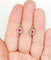 Boucles d'oreilles Dormeuses marguerite en or 18k, rubis synthétiques et diamants 58 Facettes A07748