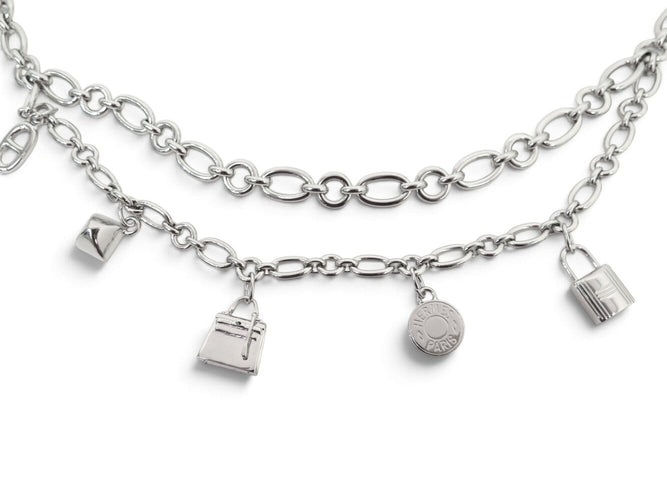 Hermès Olga - Collier en acier palladié breloques Kelly 58 Facettes 276749
