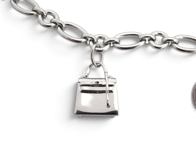 Hermès Olga - Collier en acier palladié breloques Kelly 58 Facettes 276749