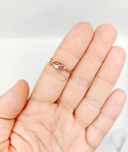 56 Bague serpent antique en or rose et rubis synthétique 58 Facettes A07774