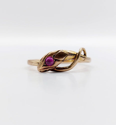 56 Bague serpent antique en or rose et rubis synthétique 58 Facettes A07774