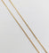 Collier chaîne vintage en or jaune 18K 58 Facettes A07777
