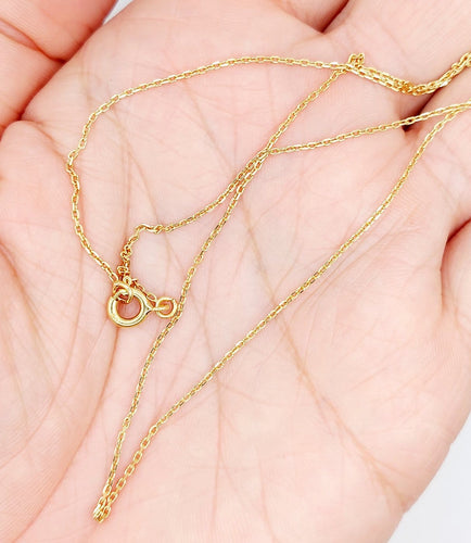 Collier chaîne vintage en or jaune 18K 58 Facettes A07777