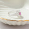 60 Bague entourage en or blanc avec rubis et diamants 58 Facettes HJ062652