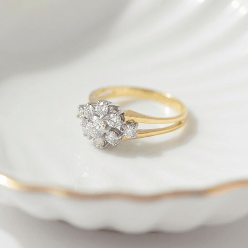 52 Wempe - Bague fleur en or jaune et diamants 58 Facettes HJ062658