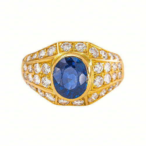 56 Bague en or jaune avec saphir et diamants 58 Facettes 5742982CN