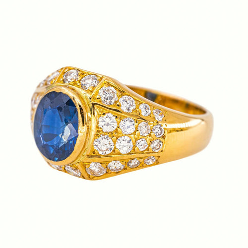 56 Bague en or jaune avec saphir et diamants 58 Facettes 5742982CN