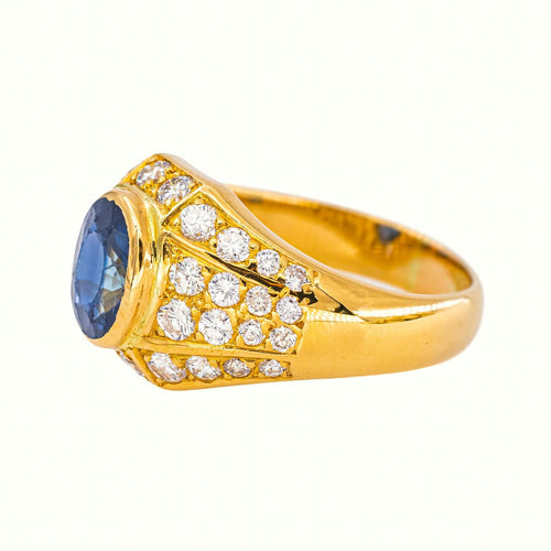 56 Bague en or jaune avec saphir et diamants 58 Facettes 5742982CN