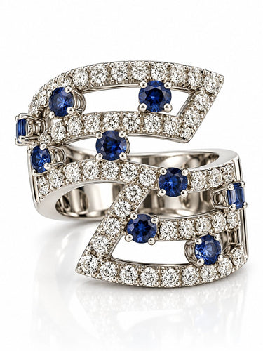 55 Bague en or blanc, diamants et saphirs 58 Facettes Ds