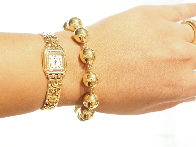 Bracelet marseillais boules 12 mm en or jaune 58 Facettes 31239