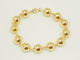Bracelet marseillais boules 12 mm en or jaune 58 Facettes 31239