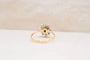 https://cdn.shopify.com/s/files/1/0963/7950/2920/files/bague-ancienne-marguerite-diamants-vintage-emeraude-centrale_b544288a-a04a-4085-9933-a0b412bfdee1.jpg?v=1789545784