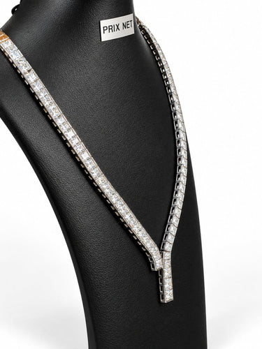 Collier Collier rivière en or blanc et diamants taille princesse 58 Facettes Pp