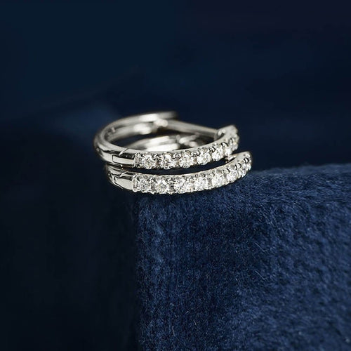 Boucles d'oreilles Embrace - Boucles d'oreilles créoles en or blanc et diamants 58 Facettes GER1356WG