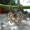 Boucles d'oreilles Boucles d'oreilles victoriennes à motifs feuillage en or 18K et diamants 58 Facettes 11224