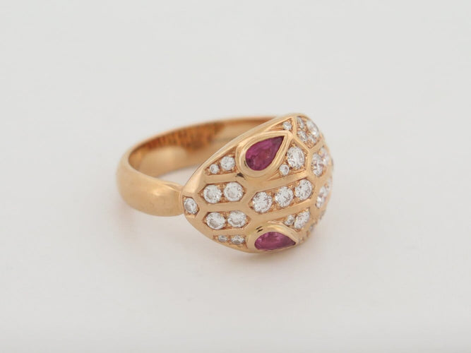 Bague 57 Bulgari Serpenti Seduttori - Bague en or rose, diamants et saphirs 58 Facettes 275123
