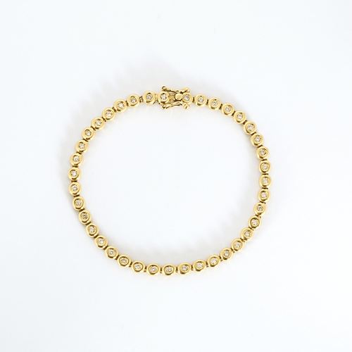Bracelet Tennis - Bracelet en or jaune et diamants 58 Facettes B260539