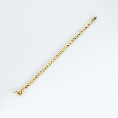 Bracelet Tennis - Bracelet en or jaune et diamants 58 Facettes B260539