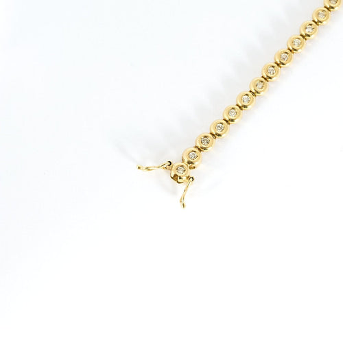 Bracelet Tennis - Bracelet en or jaune et diamants 58 Facettes B260539