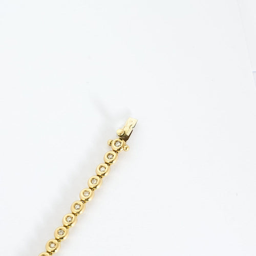 Bracelet Tennis - Bracelet en or jaune et diamants 58 Facettes B260539