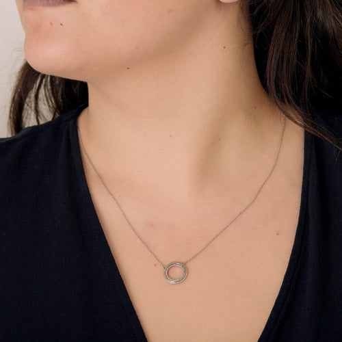 Collier Collier pendentif rond en or blanc et diamants 58 Facettes B260536
