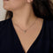 Collier Collier pendentif moderniste en or blanc et diamants 58 Facettes B260535