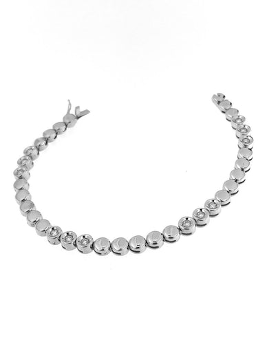 Bracelet Bracelet tennis suisse en or blanc 18 carats et diamants 58 Facettes BR1523