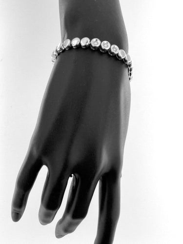 Bracelet Bracelet tennis suisse en or blanc 18 carats et diamants 58 Facettes BR1523