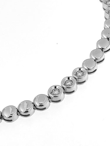 Bracelet Bracelet tennis suisse en or blanc 18 carats et diamants 58 Facettes BR1523