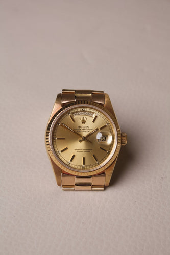 Montre Rolex Day-Date - Montre en or jaune 18 ct cadran champagne 58 Facettes MONTRE-025